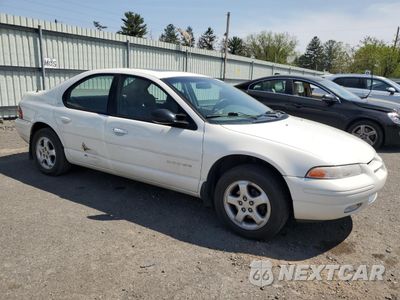 Czwarte zdjęcie samochodu z boku: 1999 DODGE STRATUS ES VIN:1B3EJ56H2XN584591 - miniatura