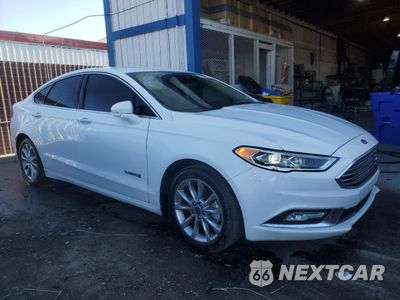 Czwarte zdjęcie samochodu z boku: 2017 FORD FUSION SE HYBRID VIN:3FA6P0LU5HR408970 - miniatura
