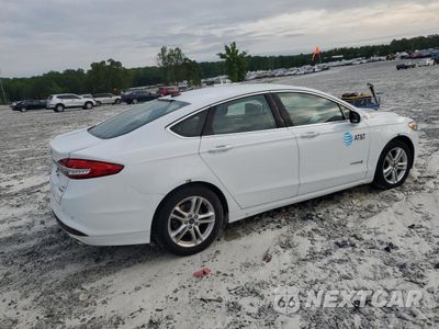 Trzecie zdjęcie samochodu z tyłu: 2018 FORD FUSION SE HYBRID VIN:3FA6P0LU9JR172040 - miniatura