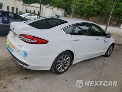Trzecie zdjęcie samochodu z tyłu: 2017 FORD FUSION SE HYBRID VIN:3FA6P0LUXHR409483 - miniatura