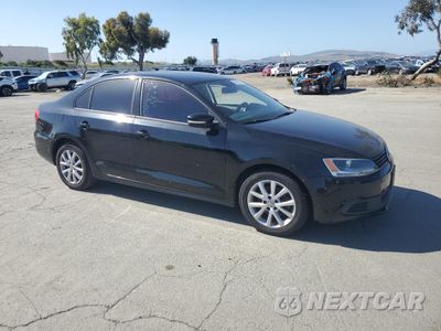 Czwarte zdjęcie samochodu z boku: 2012 VOLKSWAGEN JETTA SE VIN:3VWDP7AJ7CM451650 - miniatura