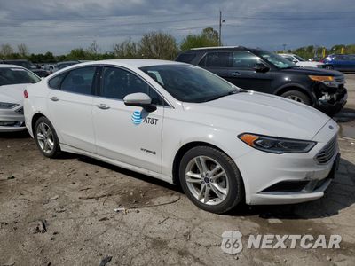 Czwarte zdjęcie samochodu z boku: 2018 FORD FUSION SE HYBRID VIN:3FA6P0LU7JR118851 - miniatura