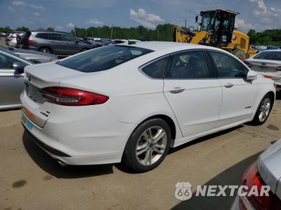Trzecie zdjęcie samochodu z tyłu: 2018 FORD FUSION SE HYBRID VIN:3FA6P0LU2JR118773 - miniatura