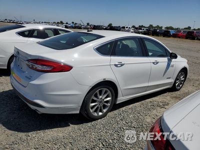 Trzecie zdjęcie samochodu z tyłu: 2017 FORD FUSION SE HYBRID VIN:3FA6P0LU2HR408926 - miniatura
