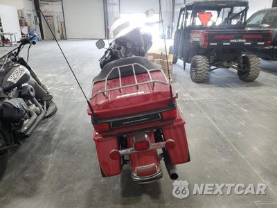 Czwarte zdjęcie samochodu z boku: 2011 HARLEY-DAVIDSON FLHTK VIN:1HD1KEM14BB660434 - miniatura