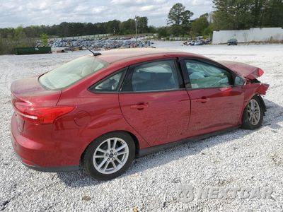Trzecie zdjęcie samochodu z tyłu: 2016 FORD FOCUS SE VIN:1FADP3F29GL219223 - miniatura
