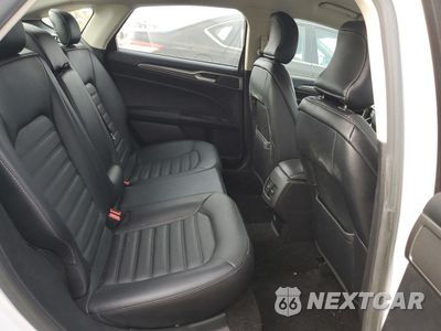 Zdjęcie 10 z 13 samochodu: 2018 FORD FUSION SE HYBRID VIN:3FA6P0LU3JR118877 - miniatura
