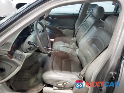 Zdjęcie 7 z 12 samochodu: 2003 CADILLAC DEVILLE VIN:1G6KD54Y23U124443 - miniatura