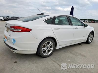 Trzecie zdjęcie samochodu z tyłu: 2018 FORD FUSION SE HYBRID VIN:3FA6P0LU4JR178456 - miniatura
