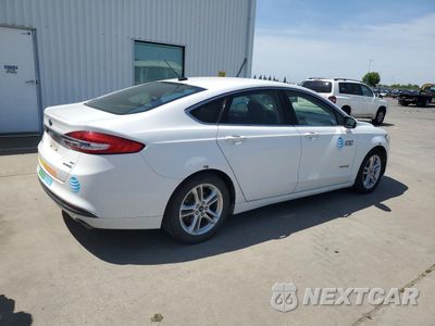 Trzecie zdjęcie samochodu z tyłu: 2018 FORD FUSION SE HYBRID VIN:3FA6P0LU3JR171546 - miniatura