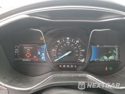 Zdjęcie 9 z 12 samochodu: 2017 FORD FUSION SE HYBRID VIN:3FA6P0LUXHR409192 - miniatura
