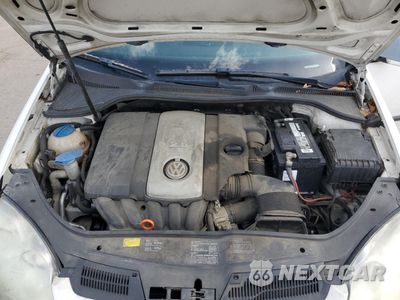 Zdjęcie 11 z 12 samochodu: 2009 VOLKSWAGEN RABBIT VIN:WVWBB71KX8W318647 - miniatura