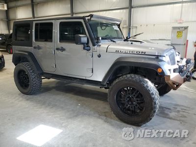 Czwarte zdjęcie samochodu z boku: 2014 JEEP WRANGLER UNLIMITED SPORT VIN:1C4HJWDG4EL103910 - miniatura