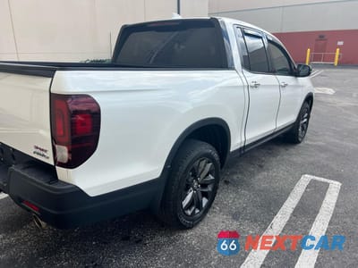 Czwarte zdjęcie samochodu z boku: 2022 HONDA RIDGELINE VIN:5FPYK3F11NB004573 - miniatura