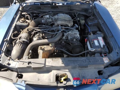 Zdjęcie 11 z 12 samochodu: 1998 FORD MUSTANG VIN:1FAFP4040WF195576 - miniatura