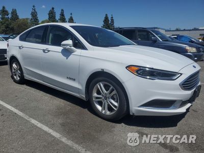 Czwarte zdjęcie samochodu z boku: 2018 FORD FUSION SE HYBRID VIN:3FA6P0LU9JR278634 - miniatura