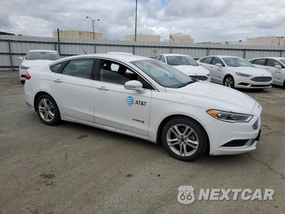 Czwarte zdjęcie samochodu z boku: 2018 FORD FUSION SE HYBRID VIN:3FA6P0LUXJR118875 - miniatura