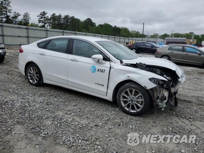 Czwarte zdjęcie samochodu z boku: 2017 FORD FUSION SE HYBRID VIN:3FA6P0LU6HR409612 - miniatura