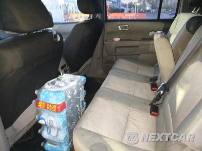 Zdjęcie 11 z 13 samochodu: 2014 HONDA PILOT LX VIN:5FNYF3H29EB026212 - miniatura