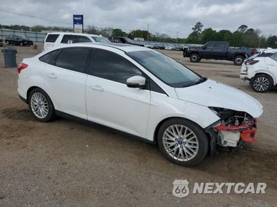Czwarte zdjęcie samochodu z boku: 2012 FORD FOCUS SEL VIN:1FAHP3H22CL338353 - miniatura