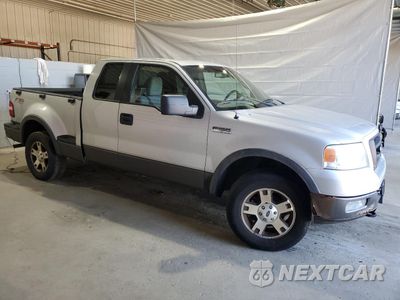 Czwarte zdjęcie samochodu z boku: 2005 FORD F150 VIN:1FTPX04525KD56204 - miniatura