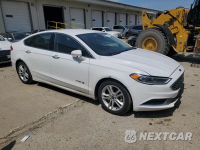 Czwarte zdjęcie samochodu z boku: 2018 FORD FUSION SE HYBRID VIN:3FA6P0LU7JR118848 - miniatura