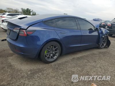 Trzecie zdjęcie samochodu z tyłu: 2021 TESLA MODEL 3 VIN:5YJ3E1EB1MF836826 - miniatura