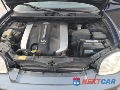 Zdjęcie 12 z 13 samochodu: 2004 HYUNDAI SANTA FE GLS VIN:KM8SC73E94U775858 - miniatura