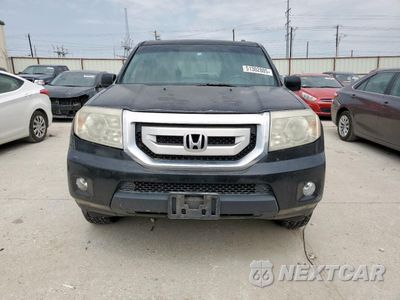 Piąte zdjęcie samochodu w środku: 2011 HONDA PILOT EXL VIN:5FNYF3H55BB001961 - miniatura
