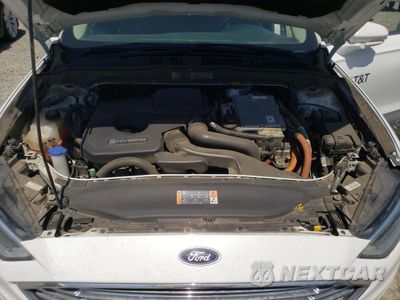 Zdjęcie 11 z 13 samochodu: 2018 FORD FUSION SE HYBRID VIN:3FA6P0LU0JR129836 - miniatura