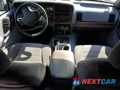 Zdjęcie 8 z 14 samochodu: 1998 JEEP GRAND CHEROKEE LAREDO VIN:1J4GZ58S5WC326028 - miniatura