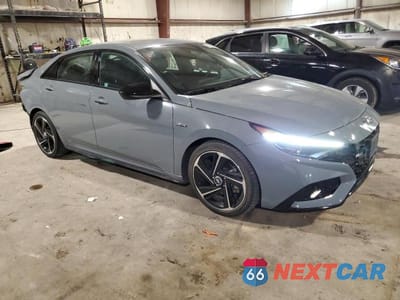 Czwarte zdjęcie samochodu z boku: 2023 HYUNDAI ELANTRA N LINE VIN:KMHLR4AF6PU414315 - miniatura