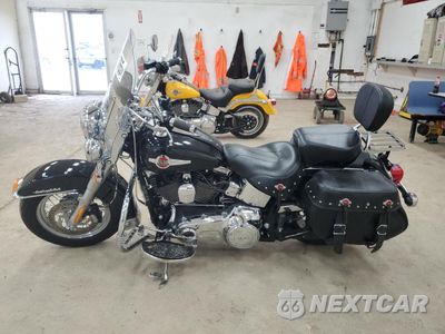 Trzecie zdjęcie samochodu z tyłu: 2016 HARLEY-DAVIDSON FLSTC HERITAGE SOFTAIL CLASSIC VIN:1HD1BWV11GB039079 - miniatura