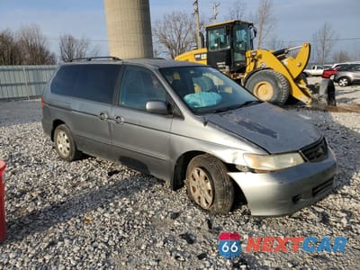 Czwarte zdjęcie samochodu z boku: 2002 HONDA ODYSSEY EXL VIN:2HKRL18952H551358 - miniatura