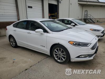 Czwarte zdjęcie samochodu z boku: 2017 FORD FUSION SE HYBRID VIN:3FA6P0LUXHR359636 - miniatura