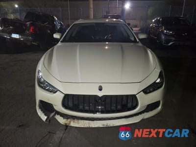 Piąte zdjęcie samochodu w środku: 2017 MASERATI GHIBLI VIN:ZAM57XSA1H1197259 - miniatura