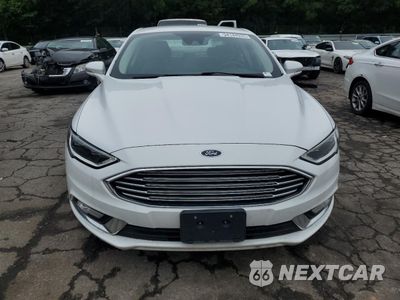 Piąte zdjęcie samochodu w środku: 2017 FORD FUSION SE HYBRID VIN:3FA6P0LU7HR409716 - miniatura
