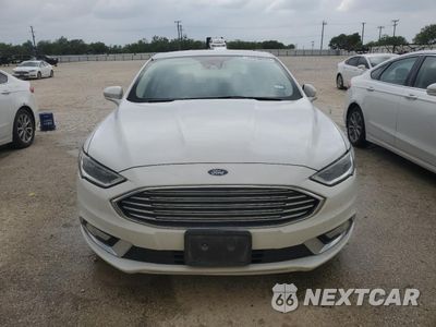 Piąte zdjęcie samochodu w środku: 2017 FORD FUSION SE HYBRID VIN:3FA6P0LU7HR408937 - miniatura