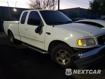 Czwarte zdjęcie samochodu z boku: 2000 FORD F150 VIN:1FTZX1723YNA22380 - miniatura