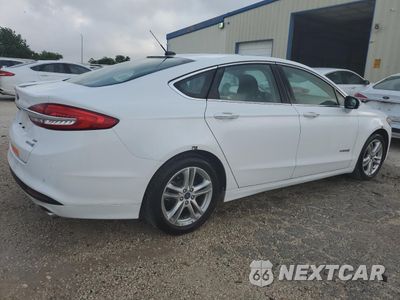 Trzecie zdjęcie samochodu z tyłu: 2018 FORD FUSION SE HYBRID VIN:3FA6P0LUXJR178476 - miniatura