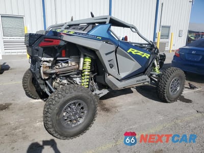 Czwarte zdjęcie samochodu z boku: 2022 POLARIS RZR TURBO R PREMIUM VIN:3NSGAV923NG376383 - miniatura