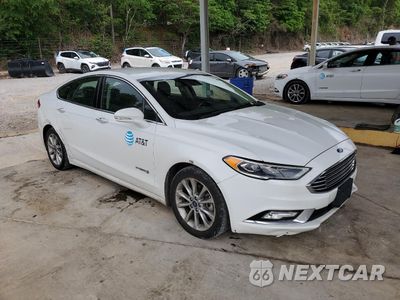 Czwarte zdjęcie samochodu z boku: 2017 FORD FUSION SE HYBRID VIN:3FA6P0LU6HR409478 - miniatura