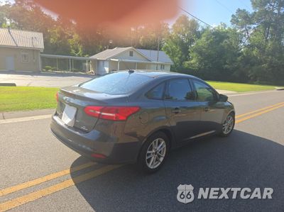 Czwarte zdjęcie samochodu z boku: 2015 FORD FOCUS SE VIN:1FADP3F26FL345599 - miniatura