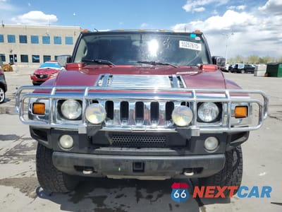 Piąte zdjęcie samochodu w środku: 2003 HUMMER H2 VIN:5GRGN23U63H142867 - miniatura