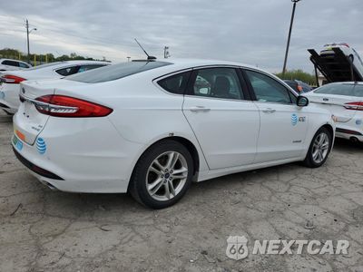 Trzecie zdjęcie samochodu z tyłu: 2018 FORD FUSION SE HYBRID VIN:3FA6P0LUXJR172046 - miniatura