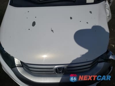 Zdjęcie 11 z 12 samochodu: 2010 HONDA INSIGHT EX VIN:JHMZE2H75AS007066 - miniatura