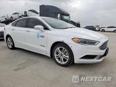 Czwarte zdjęcie samochodu z boku: 2018 FORD FUSION SE HYBRID VIN:3FA6P0LUXJR118651 - miniatura