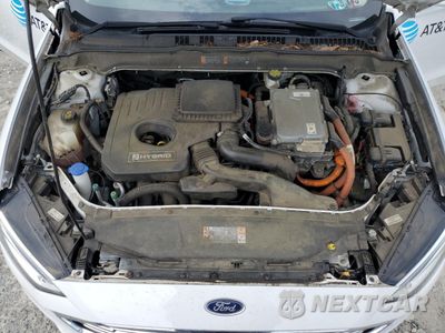 Zdjęcie 11 z 12 samochodu: 2017 FORD FUSION SE HYBRID VIN:3FA6P0LUXHR359667 - miniatura