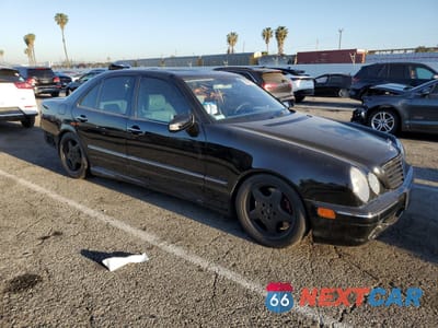 Czwarte zdjęcie samochodu z boku: 2001 MERCEDES-BENZ E 55 AMG VIN:WDBJF74JX1B363991 - miniatura