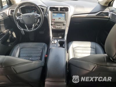 Zdjęcie 8 z 12 samochodu: 2017 FORD FUSION SE HYBRID VIN:3FA6P0LU2HR409669 - miniatura